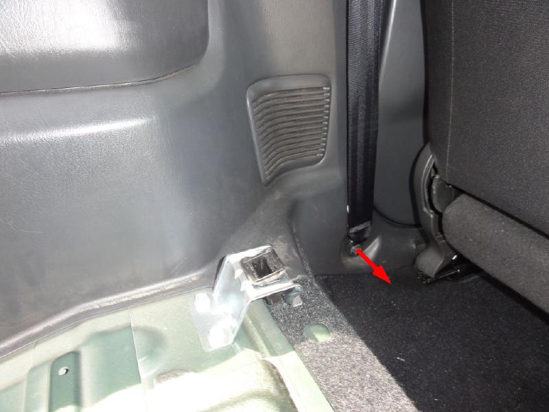 Remove the front seat belt holding screw. NOTICE: Remember to tighten this at the end of the modification. That&rsquo;s a safety piece.