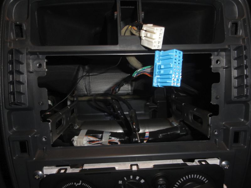 Unscrew the radio and disconnect ALL cables.