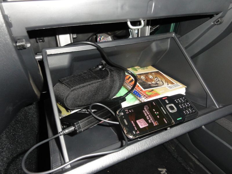 The MP3 interface can be left on the glove box.