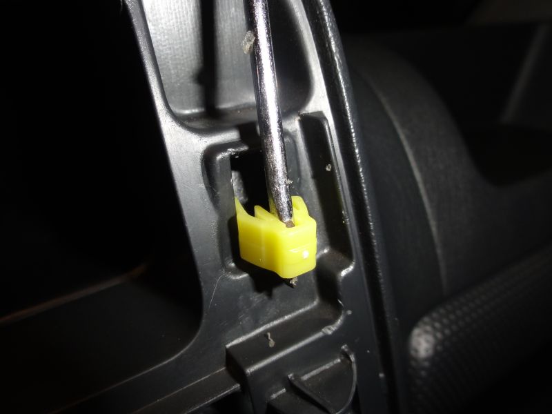 There is a little trick to remove the two clips from the top. The ventillation pipe doesn’t allow you to remove them from the rear. Push the clips inside the panel and then use a paper clip or any thin piece of metal to remove it in the reverse way.