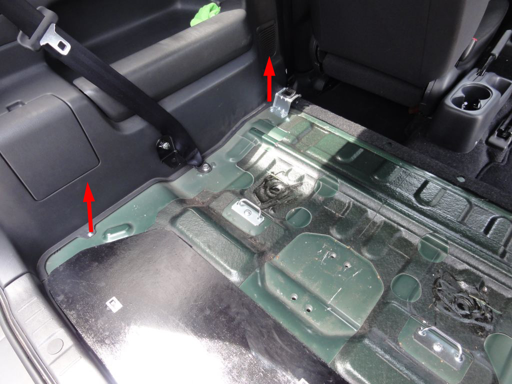 Remove the two philps screws from each corner of the side trim.